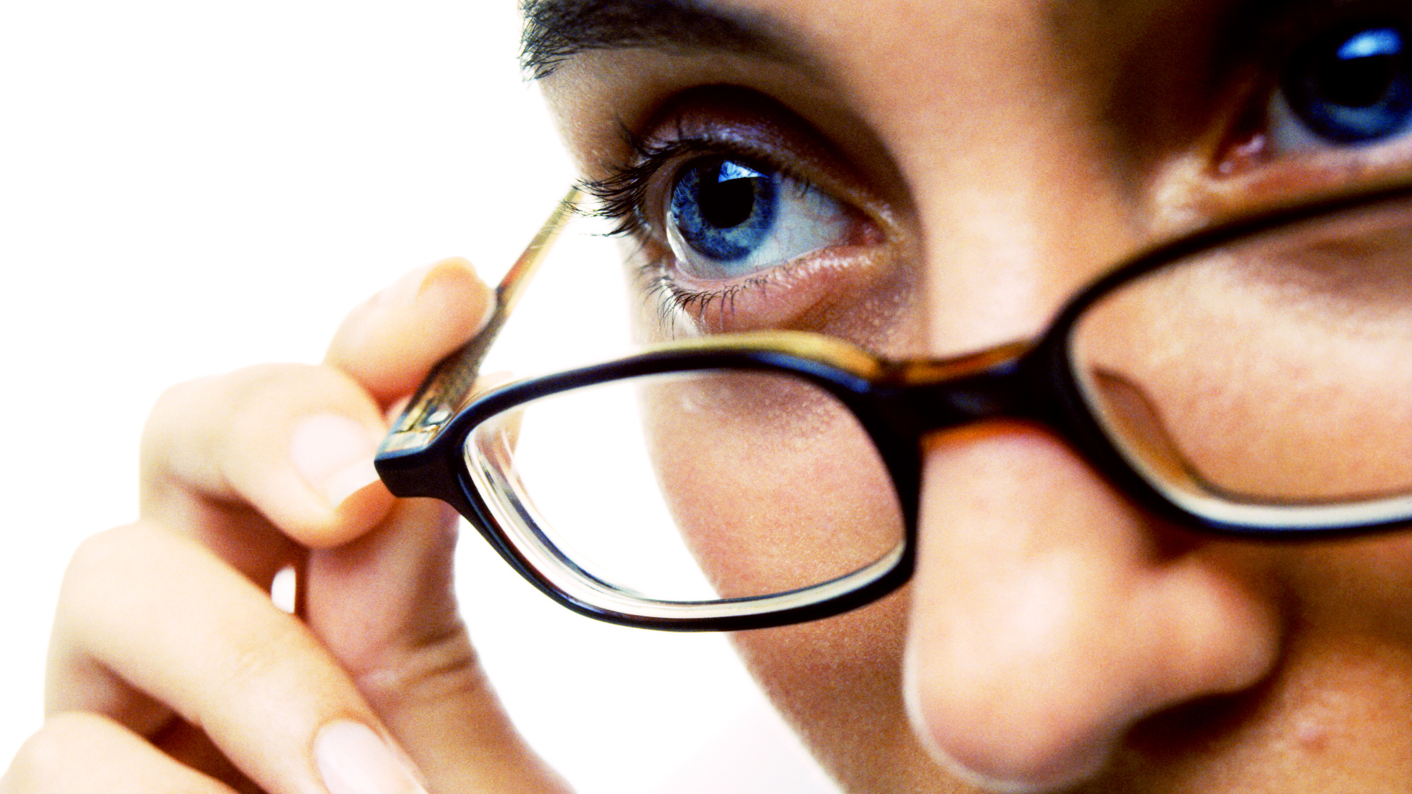 girl-peering-over-glasses